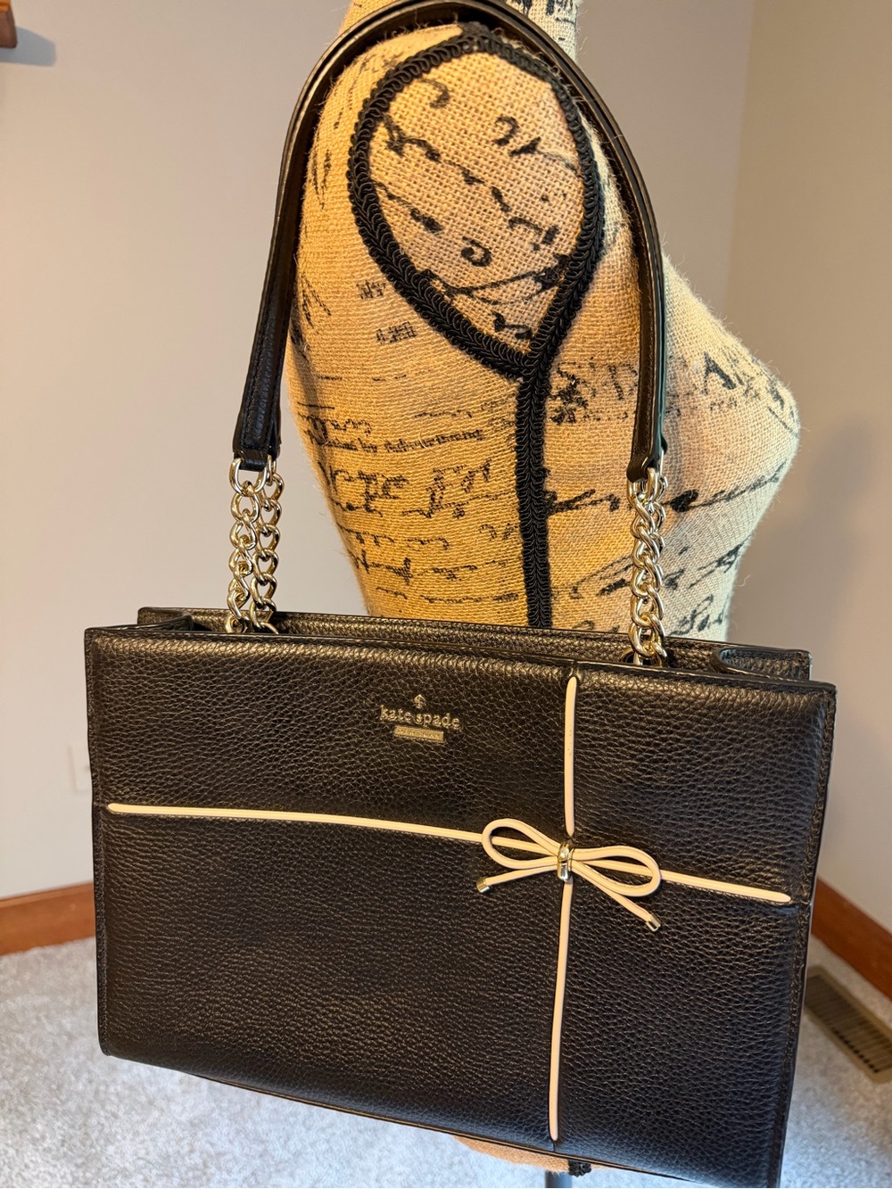 Black Kate Spade bag with Bow detail and chain handles